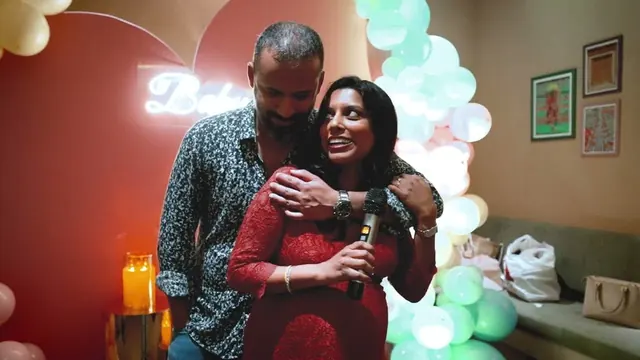 Couple at their baby shower celebration