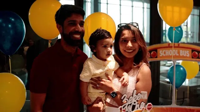 Family portrait at a first birthday party